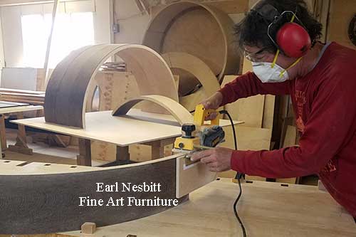 Earl hand fitting joinery for this custom made high end cabinet